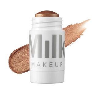 MILK MAKEUP  Dewy Cream Highlighter Stick Color: Spark - golden copper